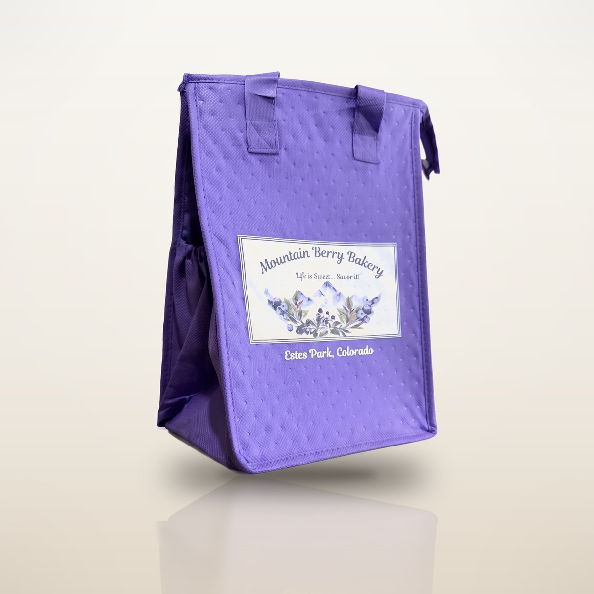 Purple insulated Mountain Berry Bakery tote bag